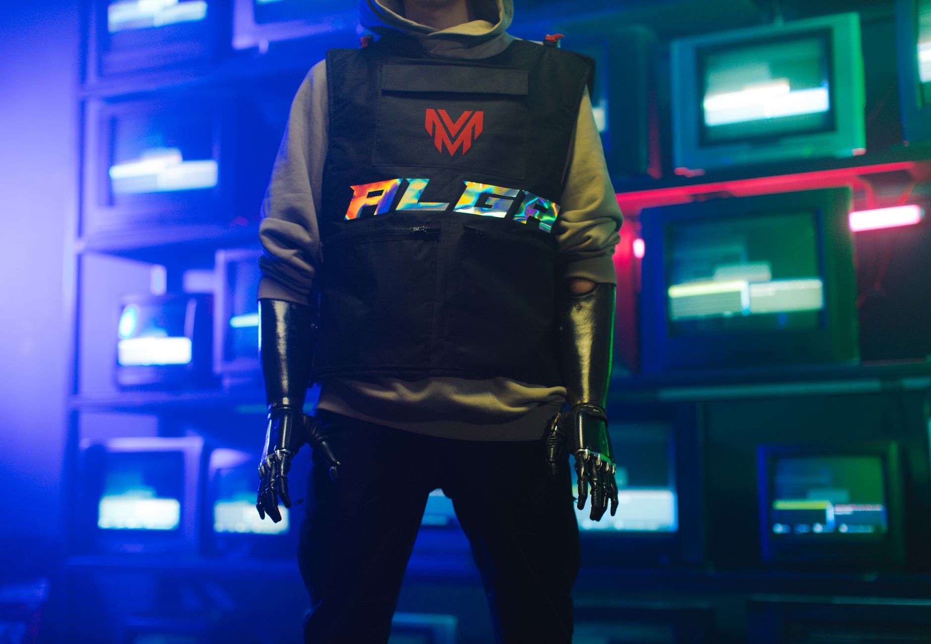 Explore cyberpunk fashion with robotic prosthetics amidst neon-lit, retro TVs.